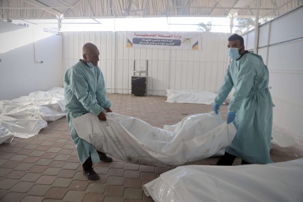 Civil defense in Gaza recovers more than 30 martyrs from a mass grave inside Al-Shifa Hospital