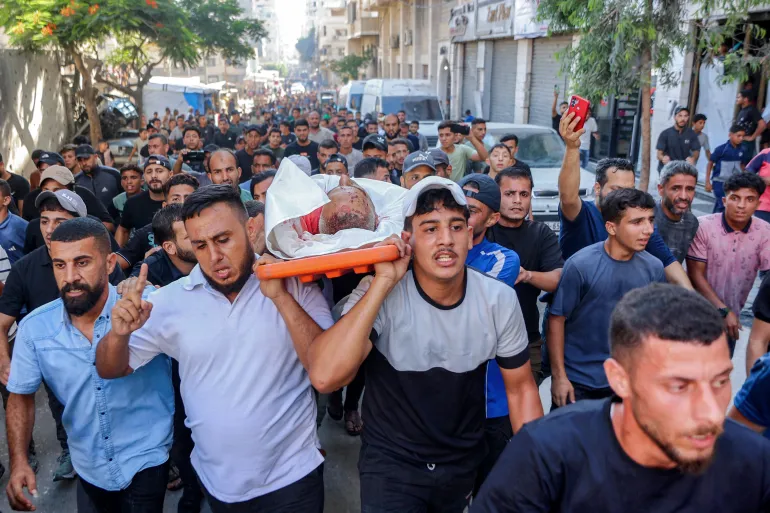 After three years under the rubble, Gaza buries the remains of 50 martyrs, most of them women and children